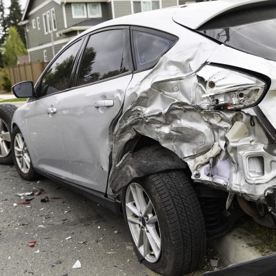 A car smashed from the rear severely damaged